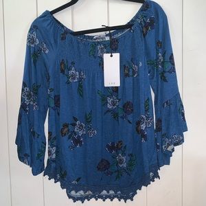 Off the shoulder long sleeved blouse